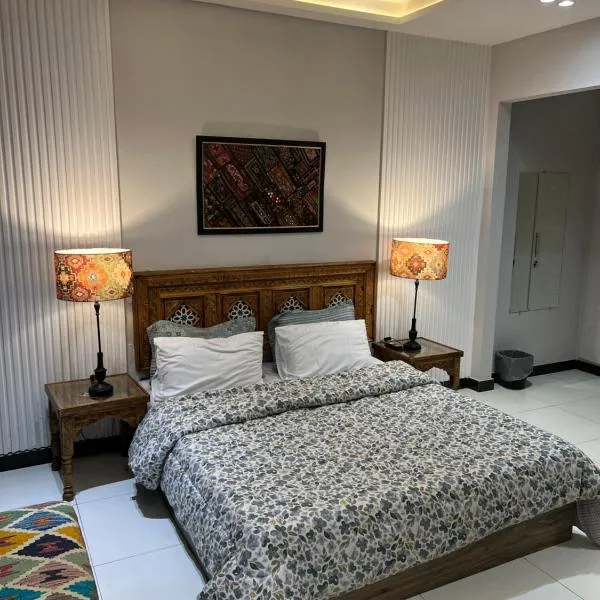 Lyallpur Home Stay, hotel v destinaci Faisalábád