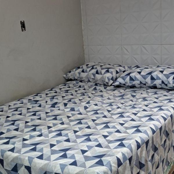 Casa completa com 2 quartos até 9 pessoas 1km do aeroporto 3km do Hangar