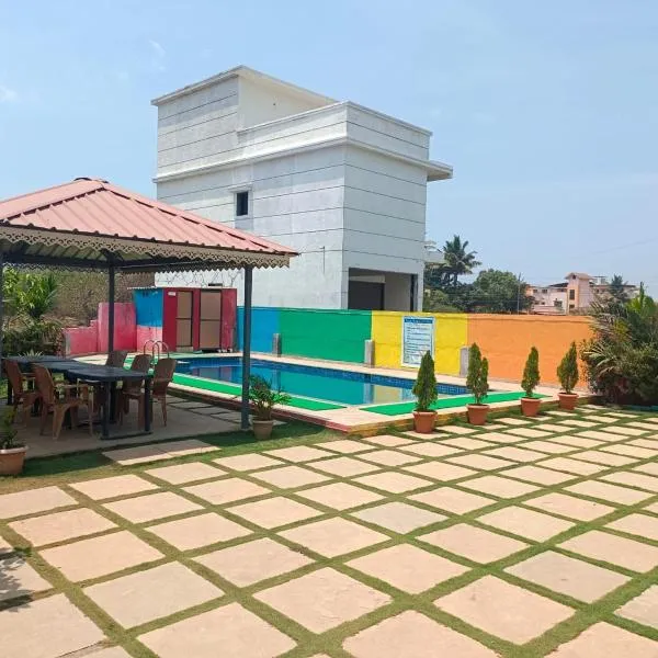 Palm Villa and Cottage, hotel v mestu Alibaug