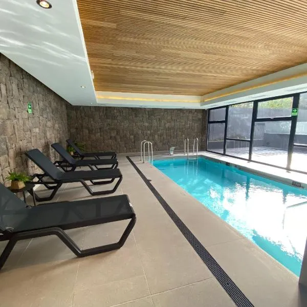 Depto a pasos de la playa, piscina, jacuzzi y patio, hotel v destinaci Puerto Varas