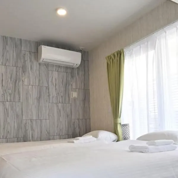 New Normal Condo in KENCHOMINAMIGUCHI ニューノーマルコンドイン県庁南口, hotel in Naha