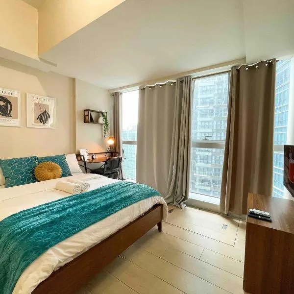 BGC Condo Facing Mitsukoshi Mall #upt122g、マニラのホテル