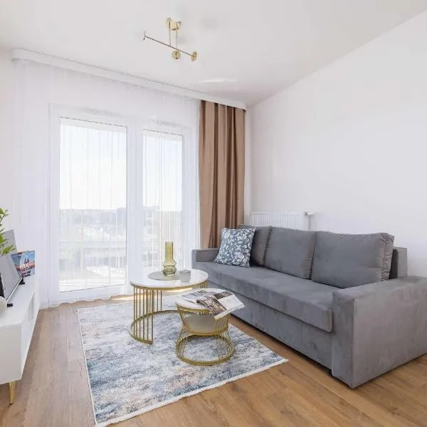 Jasny Apartament z Umeblowanym Balkonem w Krakowie Blisko Stawu by Noclegi Renters, hotel in Kraków