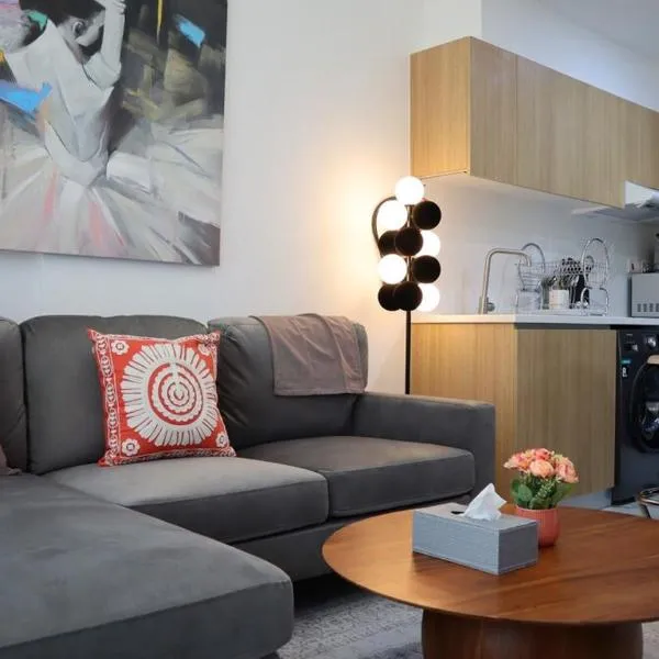 Terminal 1BR Retreat - Modern Comfort & Chic Stay, hotel in Abu Dhabi