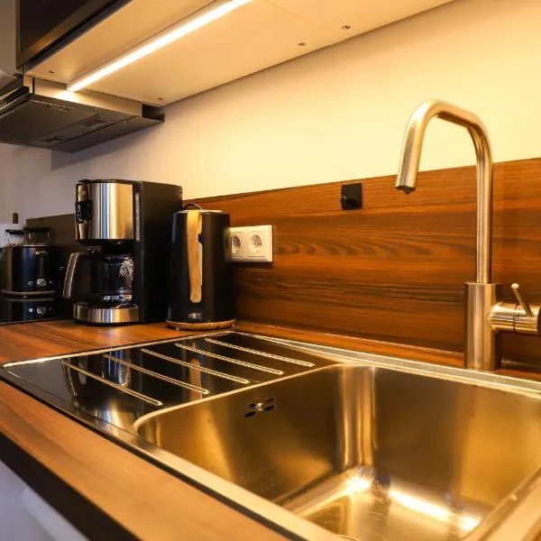 Idylle der Wetterau - Terrasse - Gartenblick - Parkplatz, Hotel in Butzbach