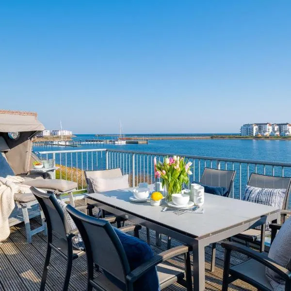 SeaPearl- Hafenblick, Terrasse, Bad mit Infrarotsauna und Whirlwanne, hotel din Olpenitz