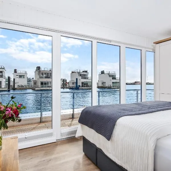 5 Beaufort - Wasserhaus, Meerblick, Sauna, Dachterrasse, Bootsanleger, Strandkorb, hotel sa Olpenitz