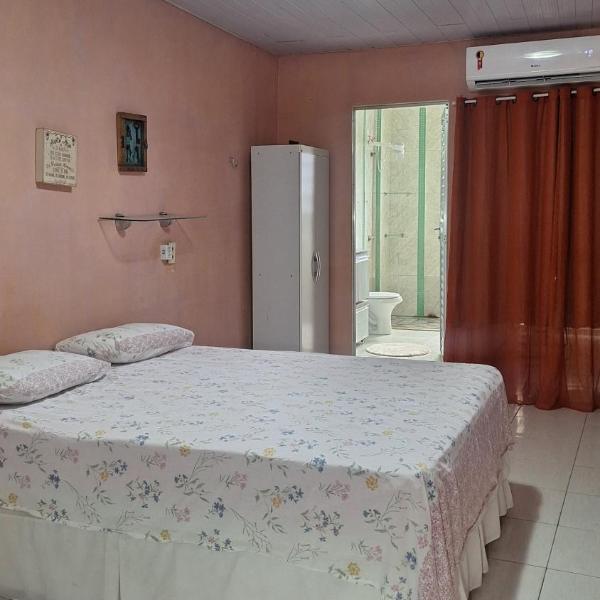 Aconchego da Marci Grande quarto confortável
