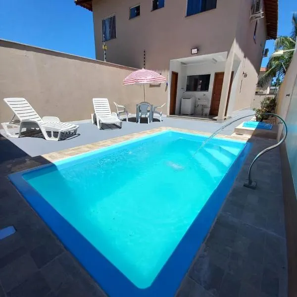 Casa Climatizada com Piscina em Jacaraipe, hôtel à Serra