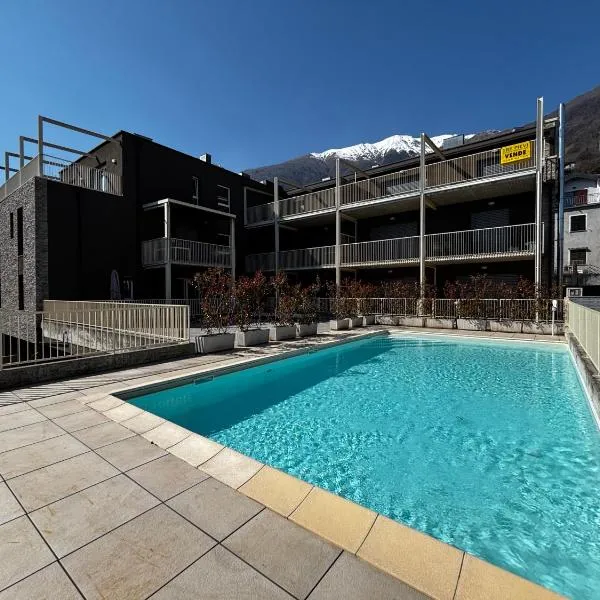 Lake view apartment with swimming pool - Larihome A87, hotel em Musso