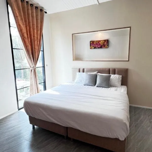 บ้านต้นลมสุวรรณภูมิ Baantonlom suvarnabhumi, hotel v destinaci Ban Khlong Thewa