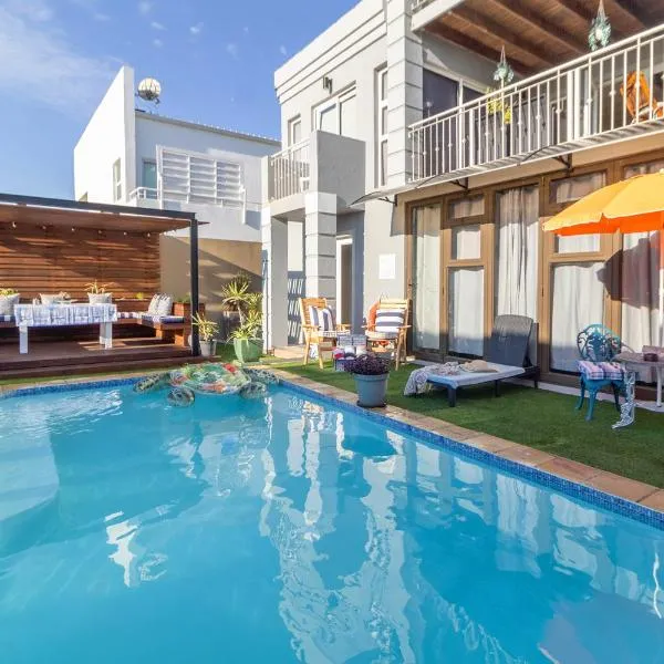 The Sandcastle Guesthouse - Melkbosstrand, готель у місті Мелкбосстранд
