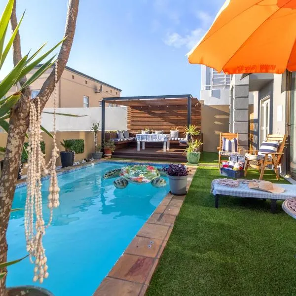 The Sandcastle Guesthouse - Melkbosstrand، فندق في مليكبوستراند