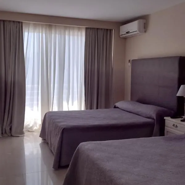 Lofts & Suites, hotel in Rosario