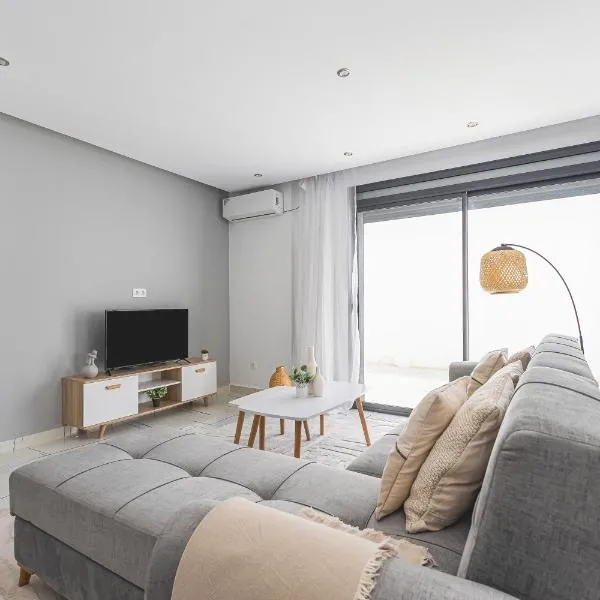 Appartement coquet de 3 pièces à Birkhadem, hotel in Birkhadem