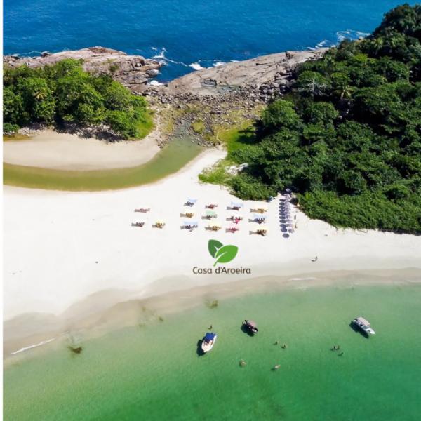 Casa d'Aroeira Residencial Boutique - Centro de Juqueí - Perto de Tudo - 2 quadras do Mar - Serviço de Praia - Roupa de Cama 600 fios algodão Egípcio - Tudo Novo - Estacionamento Interno - Cozinha - Consulte unidades com Ofurô Hidro e Cromoterapia - Foto 4