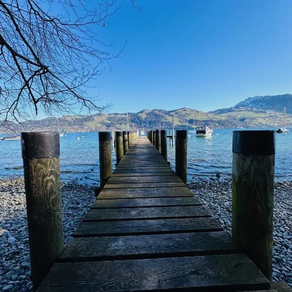 Stilvoll, am Thuner See, nähe Interlaken, Familienfreundlich mit Garten, WIFI, hótel í Einigen
