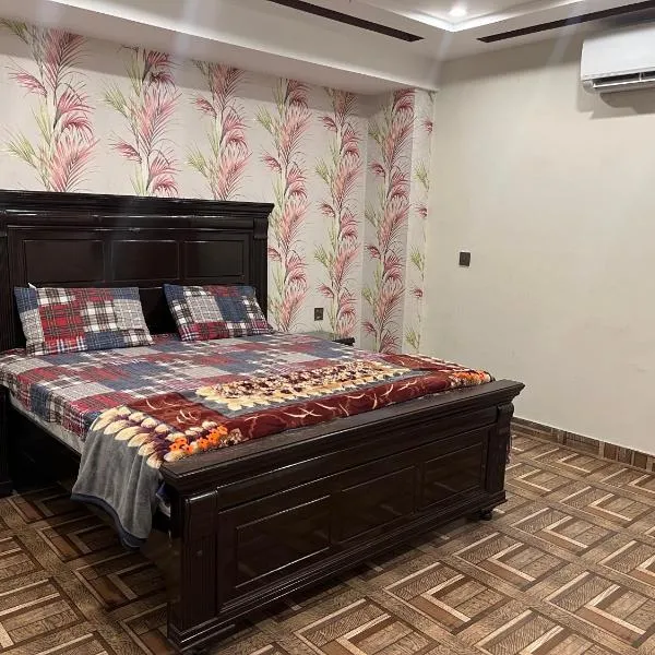 AS Guest Rooms, viešbutis mieste Ado Rāi