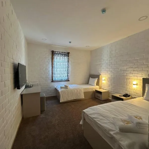 Macan Boutique Hotel、Yunusobodのホテル