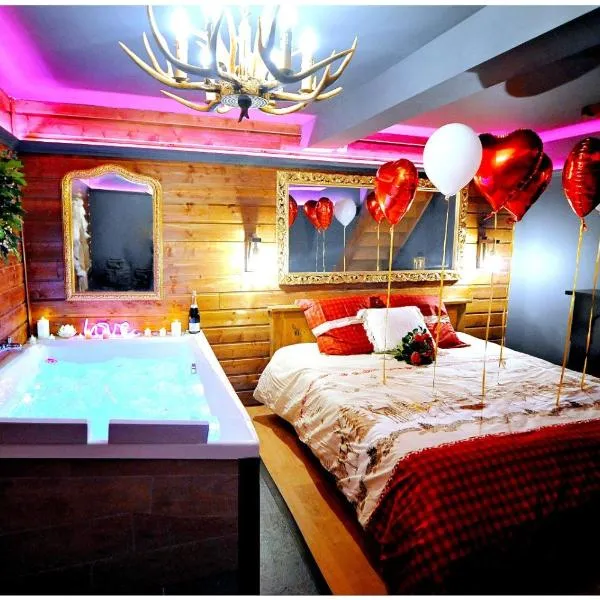 Le Chalet romantique, SPA XXL, Écran cinéma, Lit king size, cascade d'eau, hotel in Bourgoin
