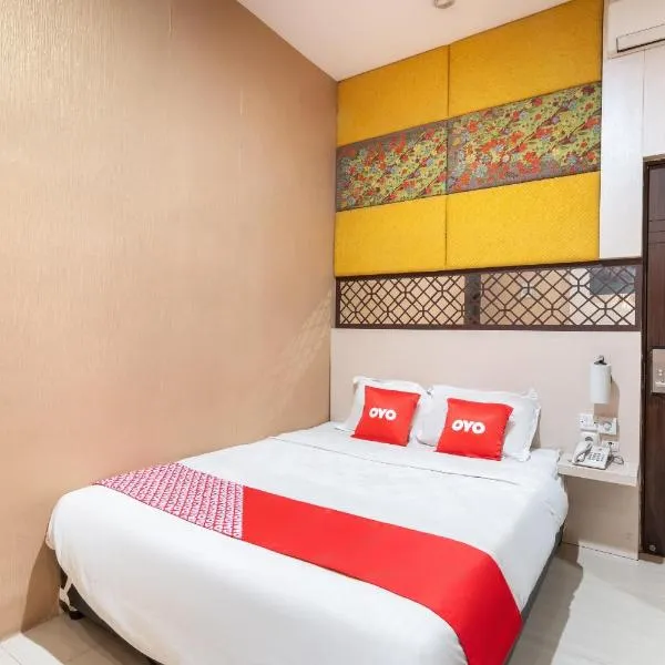 Super OYO Flagship 91863 Metro House, hotel di Putat-wetan