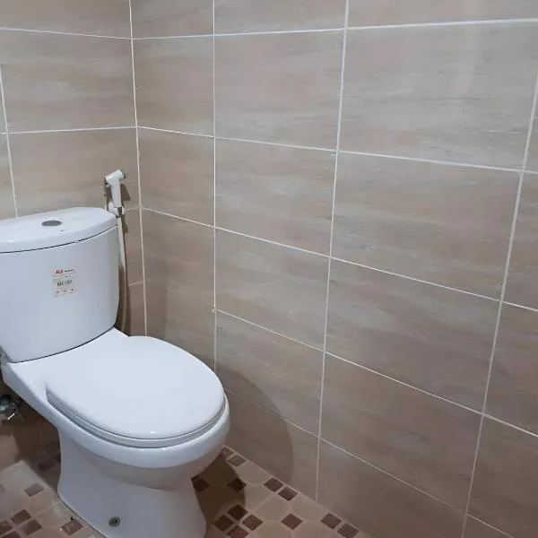 Hotel O Emmy Homestay Syariah, отель в городе Mamuju