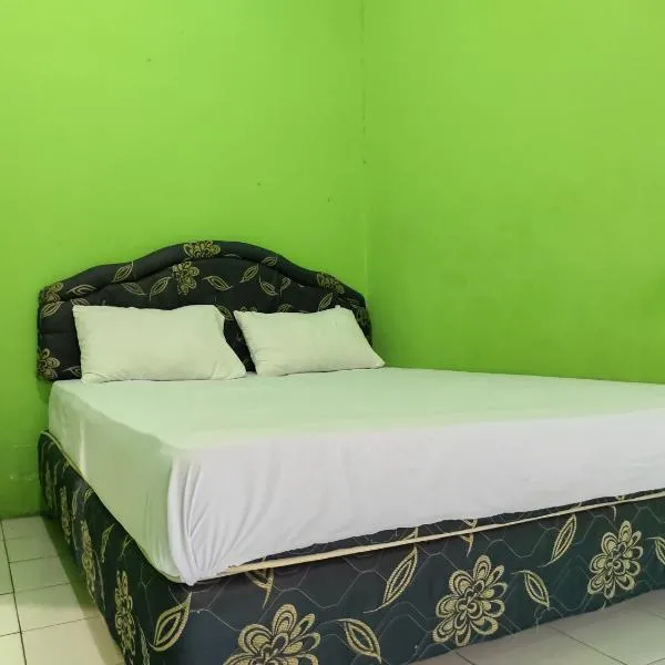 OYO 93411 Syariah Hotel Tomborang, отель в городе Karema