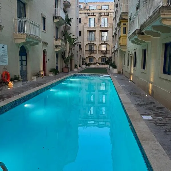 Apartment with pool, hotel in Mġarr