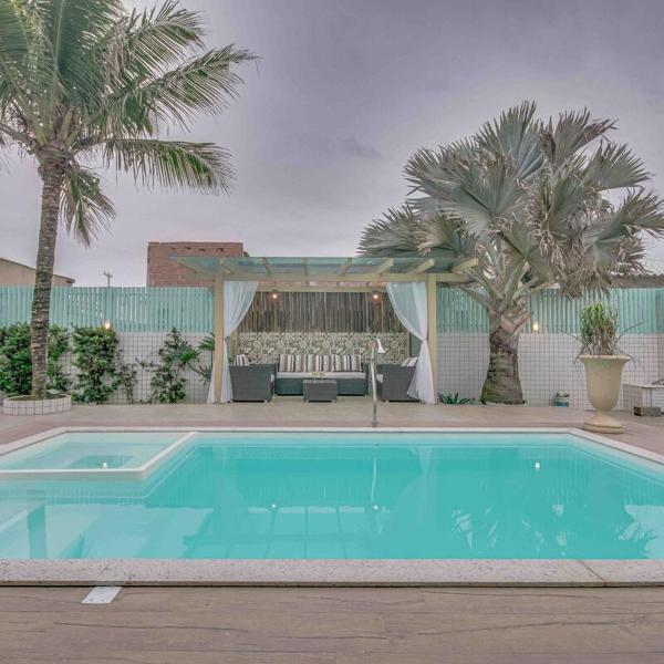 casa pé na areia