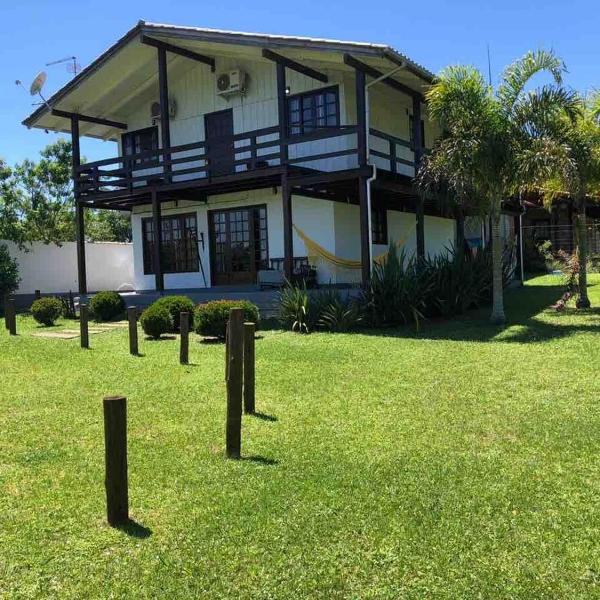 Nossa casa com muito verde no Rosa