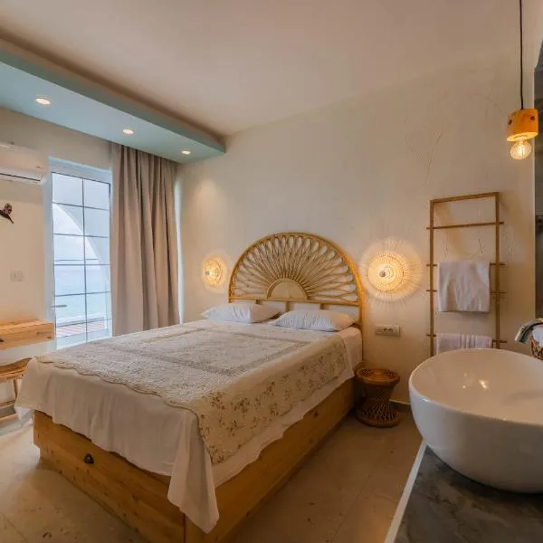 Delfini Pearl Stegna Beach, hotel v destinaci Archangelos