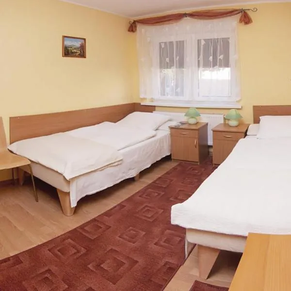 Dom Gościnny Pod Brzozami، فندق في بوزنان