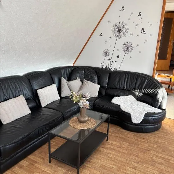 FeWo Lüttje Amselnüst - zentrale Lage mit Balkon, hotel din Dornum