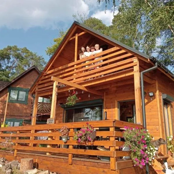 Nowy dom całoroczny nad jeziorem wielkie parteczyny, hotel in Kurzętnik
