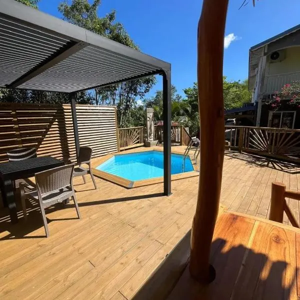 Appartement confortable avec piscine à Deshaies 60 m², hotel a Deshaies