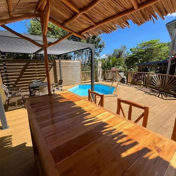 Appartement confortable avec piscine à Deshaies 60 m², hôtel à Deshaies