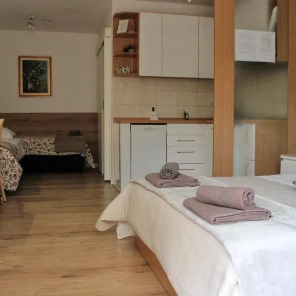 Studio Laura-spacious studio on the main beach, хотел в Макарска