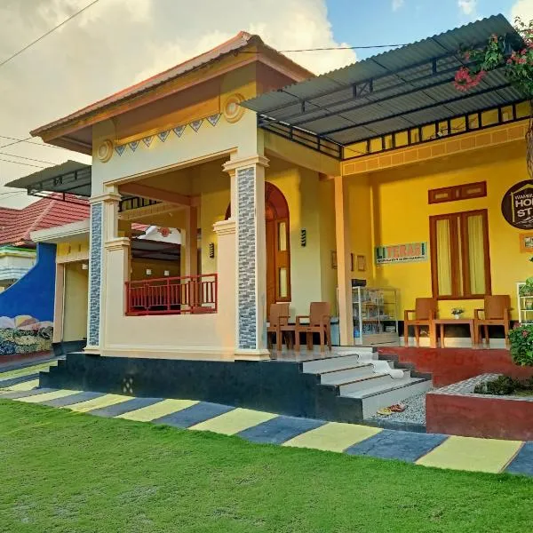 Wambuliga Homestay, hotel di Waha