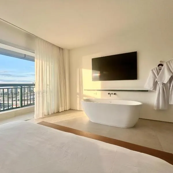 Conforto e Vista Panorâmica com Banheira Hotel Vision TV WiFi Ar Cond e Cozinha, hotel in Brasília