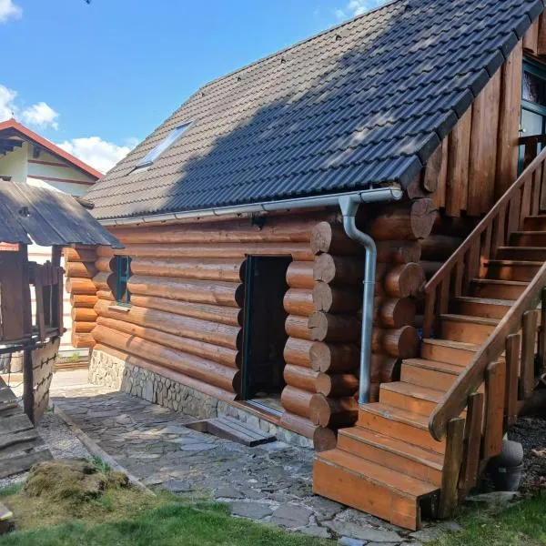 Srubové apartmány Rak, hotel v destinaci Černá v Pošumaví