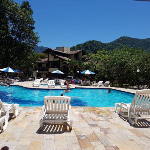 Casa de condomínio com piscina em frente a praia de Maresias