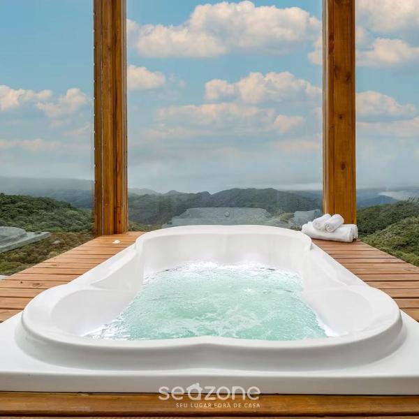 Linda cabana com jacuzzi na montanha VST013