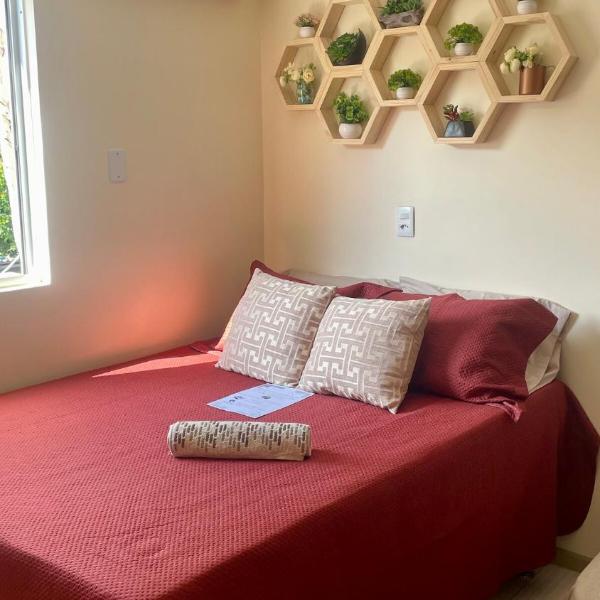 Apartamento central, completo, com ar condicionado, cozinha e WIFI