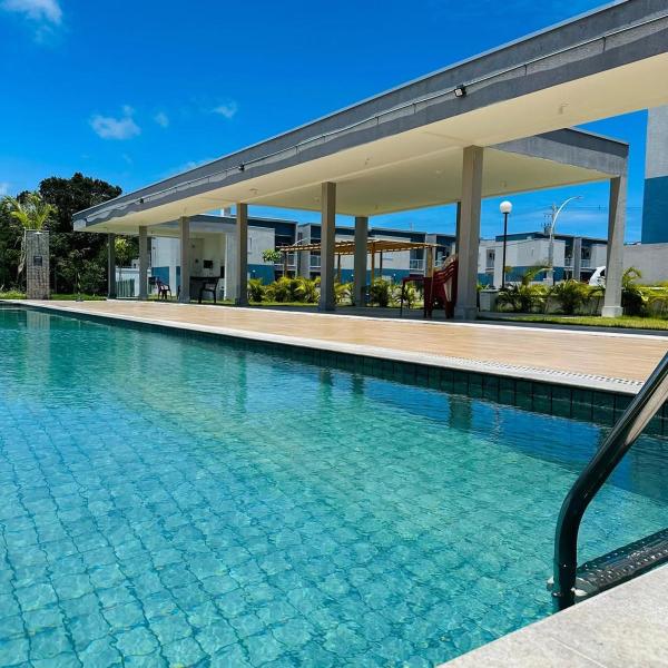 Aconchego da Alê em Porto, Ar condicionado e Piscina, Apartamento inteiro, Cozinha completa, Wifi, 02 Quartos confortáveis, travesseiro nasa , Colchão confortável ideal para férias descanso lazer ou negócios