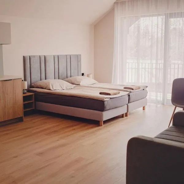 Beztroska Zatoka - ośrodek wypoczynkowy Jacuzzi & Sauna, viešbutis mieste Połajewo