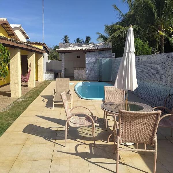 House with pool in condominium