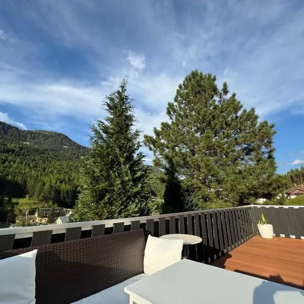 Urlaub mit Bergblick - Ferienhaus in Bad Bleiberg, hotel in Bad Bleiberg