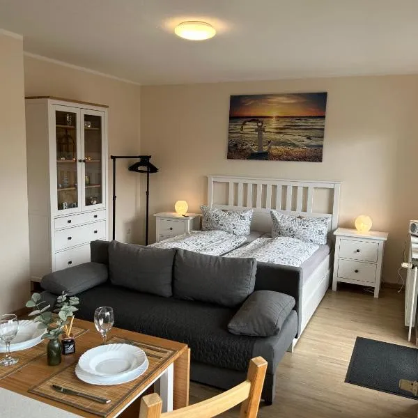 Ferienwohnung Ritthoff Perlebucht - mit Strandkorb am Meer und kostenloser Eintritt ins Schwimmbad, hotel in Büsum