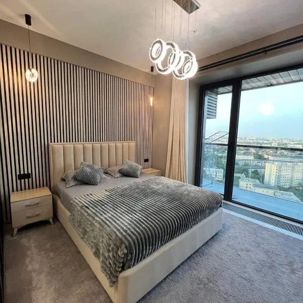 Luxury flat with a view of a city! 19th floor, hotel in Tashkent