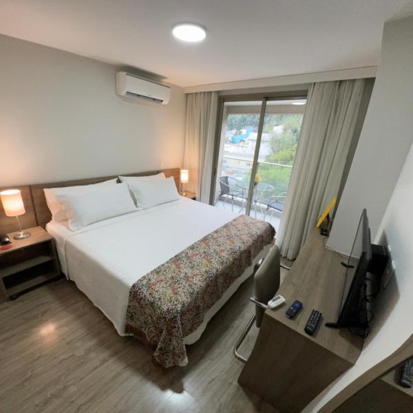 Suíte Econômica com Conforto de Luxo Próxima à Praia e aos Eventos - Foto 3
